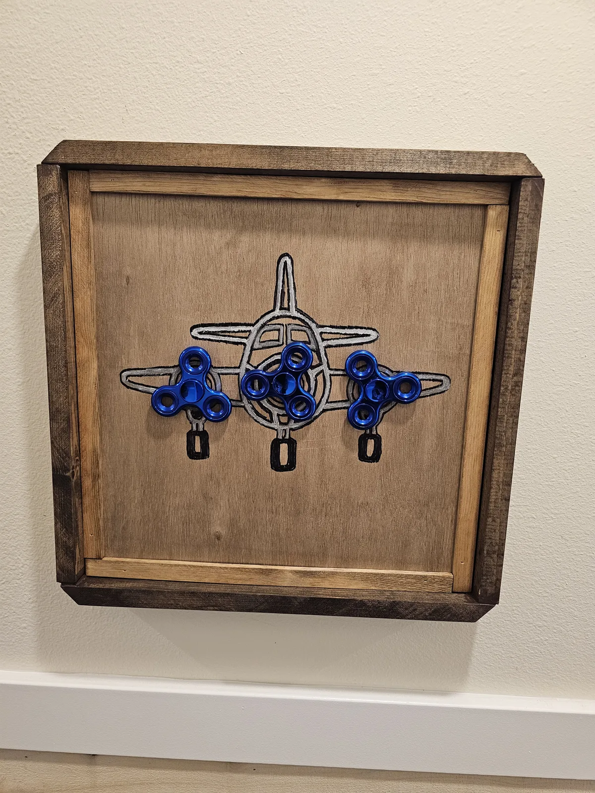 Fidget spinner airplane art, an interactive sensory station for fine motor engagement
